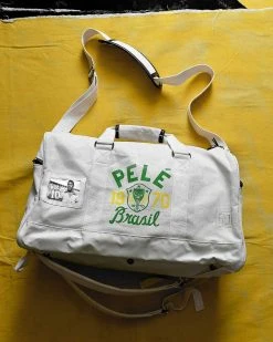 NEW ARRIVALS Pelé Brasil #10 Ivory Duffle Bag